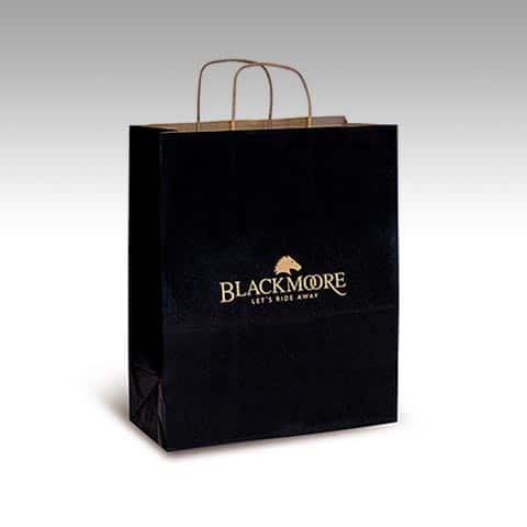 BLACKMOORE : Création du nom, baseline et logo reprenant les codes de l'équitation anglaise et du luxe avec les doubles anneaux - Agence Linéal